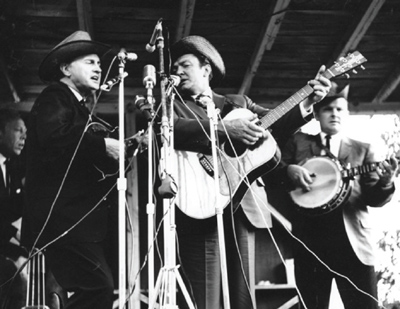 Fincastle Virginia, 1965 L:R - George Shuffler, Bill Monroe, Carter Stanley and Ralph Stanley. (Photo by Ron Petronko.)